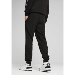 Męskie spodnie dresowe PUMA Sport PUMA Black. Czarne spodnie sportowe męskie Puma, m, bez wzorów, z dresówki, do biegania. W wyprzedaży za 104.00 zł.