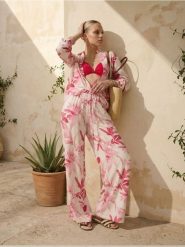 Wiskozowe spodnie wide leg ze wzorem kwiatowym - wielobarwny. Spodnie materiałowe damskie Sinsay, l, bez wzorów, z wiskozy. Za 39.99 zł.