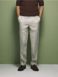 Lniane spodnie garniturowe - beżowy. Brązowe eleganckie spodnie męskie Reserved, bez wzorów, z tkaniny. Za 199.99 zł.