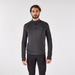 Bluza do biegania męska Kiprun Run 100 Warm ocieplana. Czarne bluzy męskie KIPRUN, m, bez wzorów, z materiału, bez kaptura, do biegania. Za 59.99 zł.