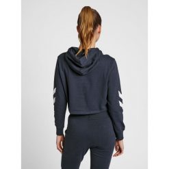 Damska bluza z kapturem crop top Hummel hmlLEGACY. Niebieskie bluzy damskie Hummel, s, bez wzorów, z kapturem, do piłki ręcznej. Za 167.50 zł.