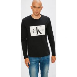 Calvin Klein Jeans - Longsleeve. Czarne bluzki z długim rękawem męskie Calvin Klein Jeans, z nadrukiem, z bawełny, z okrągłym kołnierzem. Za 249.90 zł.