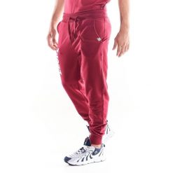 Spodnie męskie Leone 1947 Apparel. Czerwone spodnie sportowe męskie LEONE 1947 APPAREL, m, bez wzorów, z bawełny, na fitness i siłownię. Za 126.26 zł.
