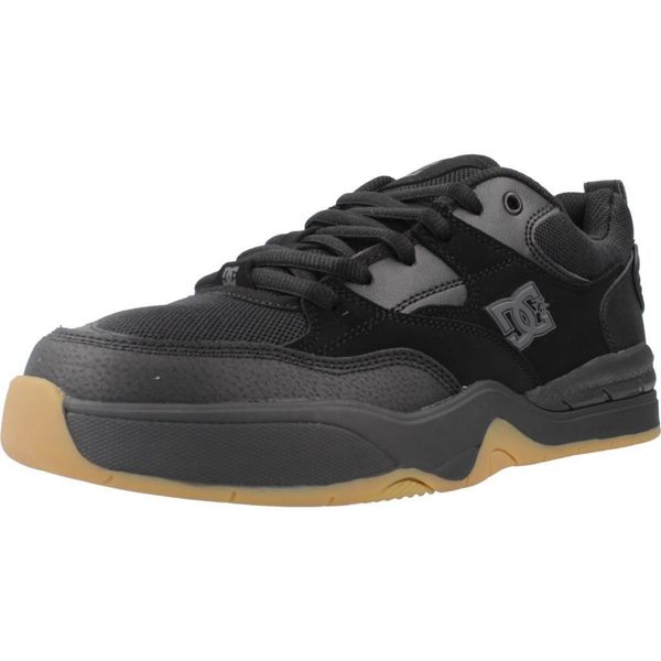Buty DC ADYS100844 Czarny. Czarne trampki męskie DC Shoes, bez wzorów, ze skóry, bez zapięcia. Za 389.99 zł.
