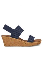 Skechers Sandały Beverlee-Sheer Luck 119571/NVY Granatowy. Niebieskie sandały damskie Skechers, bez wzorów, z materiału, bez obcasa, na koturnie, bez zapięcia. Za 189.99 zł.