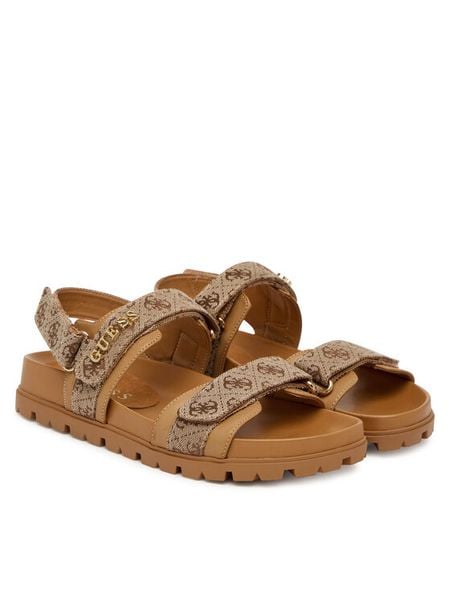 Guess Sandały FLPZY2 FAL03 Brązowy. Brązowe sandały damskie Guess, z aplikacjami, z materiału, bez obcasa, na płaskiej podeszwie, bez zapięcia. Za 398.99 zł.