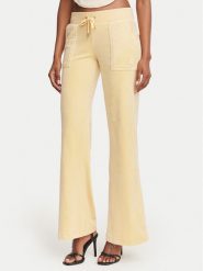 Juicy Couture Spodnie dresowe Layla JCSEBJ001G Żółty Regular Fit. Żółte spodnie dresowe damskie Juicy Couture, m, bez wzorów, z dresówki. Za 322.99 zł.