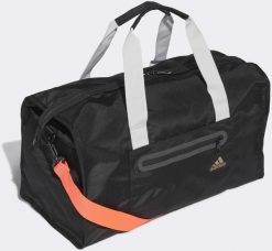Torba sportowa Adidas ID Duffel Bag czarna. Czarne torby na ramię damskie Adidas, bez wzorów, z poliesteru, sportowe, bez dodatków. Za 301.99 zł.