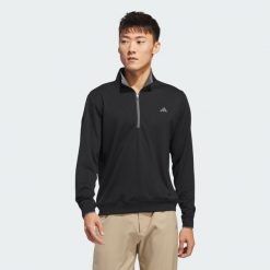 Koszulka Lightweight Half-Zip. Czarne koszulki sportowe męskie Adidas, uniwersalny, bez wzorów, z materiału, bez kołnierzyka, bez ramiączek, na golfa. Za 279.00 zł.