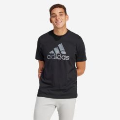 Koszulka z krótkim rękawem męska ADIDAS Gym & Pilates. Czarne koszulki sportowe męskie Adidas, m, bez wzorów, z bawełny, bez kołnierzyka, bez ramiączek, na fitness i siłownię. Za 119.99 zł.