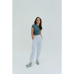 Koszulka treningowa do jogi Moonholi Timeless z krótkim rękawem. Szare koszulki sportowe damskie MOONHOLI, xl, bez wzorów, bez kołnierzyka, bez ramiączek, na jogę i pilates. Za 259.00 zł.