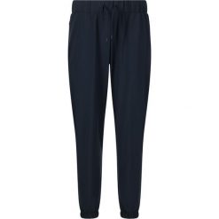 Damskie spodnie dresowe Athlecia Austberg. Niebieskie spodnie dresowe damskie Athlecia, bez wzorów, z dresówki, na fitness i siłownię. Za 255.00 zł.