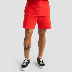 Szorty męskie regular z regulacją w pasie czerwone Limitless. Czerwone krótkie spodenki sportowe męskie GYMBEAM, m, bez wzorów, z bawełny, trekkingowe. Za 98.90 zł.