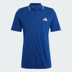 Koszulka Essentials 3-Stripes Piqué Polo. Białe koszulki polo męskie Adidas, s, bez wzorów, z materiału, bez ramiączek. W wyprzedaży za 116.35 zł.