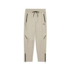 Spodnie do biegania Puma Pumatech. Brązowe eleganckie spodnie męskie Puma, s, bez wzorów, z dresówki. Za 308.00 zł.