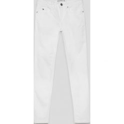 Tommy Hilfiger - Jeansy dziecięce 140-176 cm. Jeansy dla dziewczynek marki Tommy Hilfiger. Za 269.90 zł.