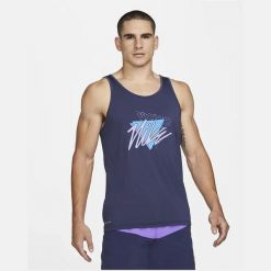 Męskie koszulka bez rękawów Dri-FIT TANK TOP MEN VIBE MIDNIGHT NAVY. Niebieskie t-shirty męskie Nike, na lato, m, bez wzorów, sportowe, bez kołnierzyka. Za 162.00 zł.