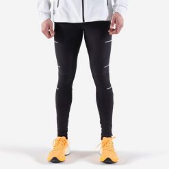 Legginsy do biegania męskie Kiprun Run 900 Rain. Czarne legginsy sportowe męskie KIPRUN, l, bez wzorów, z materiału, do biegania. Za 189.99 zł.