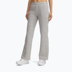Spodnie damskie Under Armour Rival Fleece Piped. Szare obuwie sportowe damskie Under Armour, bez wzorów, na fitness i siłownię. Za 209.99 zł.