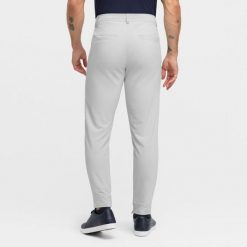 Męskie golofowe spodnie joggery Golf Siroko Olivos Gray. Szare spodnie sportowe męskie SIROKO, m, bez wzorów, z materiału, na golfa. Za 423.00 zł.