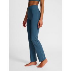 Spodnie legginsy z wysokim stanem dla kobiet Hummel. Niebieskie legginsy damskie Hummel, bez wzorów, z podwyższonym stanem, na jogę i pilates. Za 205.00 zł.