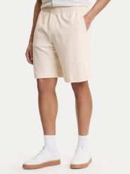 Guess Szorty sportowe M6GD16 K3088 Écru Regular Fit. Krótkie spodenki sportowe męskie Guess, m, z aplikacjami, z bawełny. Za 379.99 zł.