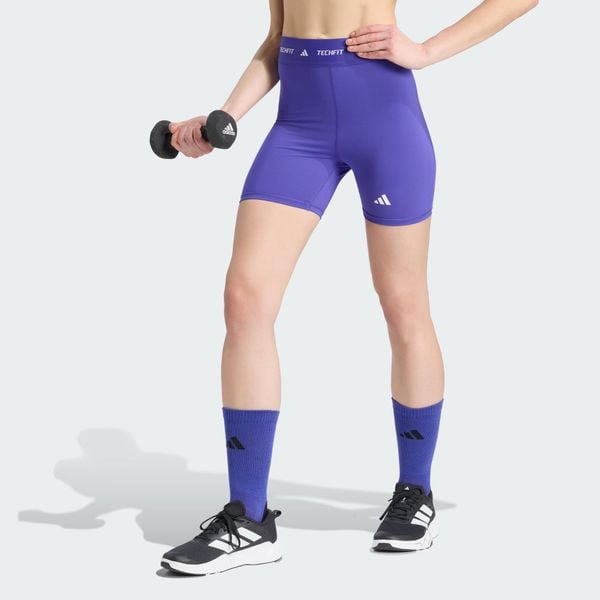 Krótkie legginsy TECHFIT. Fioletowe legginsy damskie Adidas, l, bez wzorów, z elastanu, z podwyższonym stanem, krótkie, na fitness i siłownię, techfit (adidas). Za 83.30 zł.
