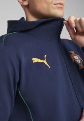 Męska rozpinana kurtka z kapturem Portugalia Casuals PUMA. Niebieskie kurtki męskie Puma, m, bez wzorów, klasyczne, bez kaptura. Za 226.58 zł.