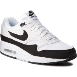 Buty NIKE - Air Max 1 319986 109 White/Black. Białe obuwie sportowe damskie Nike, bez wzorów, z materiału, bez obcasa, na płaskiej podeszwie, bez zapięcia. W wyprzedaży za 459.00 zł.