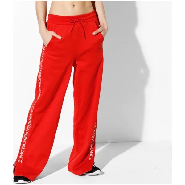 Calvin Klein Spodnie Knit , czerwony, rozmiar S. Czerwone spodnie dresowe damskie Calvin Klein, s, bez wzorów, z bawełny. W wyprzedaży za 349.99 zł.