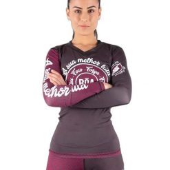 Damska koszulka typu rashguard Boa Fightwear A Sua Melhor Luta. Fioletowe koszulki sportowe damskie BOA FIGHTWEAR, s, bez wzorów, ze skóry, bez kołnierzyka, bez ramiączek. Za 197.50 zł.
