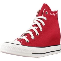 Buty CONVERSE CHUCK TAYLOR ALL STAR WEDGE Bordeaux. Czerwone trampki i tenisówki damskie Converse, bez wzorów, z tkaniny, retro, bez zapięcia. Za 387.99 zł.