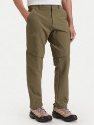 Adidas Spodnie outdoor KW7459 Brązowy Regular Fit. Brązowe spodnie sportowe męskie Adidas, m, bez wzorów, z syntetyku, outdoorowe. Za 349.99 zł.