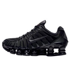 Buty do chodzenia dla dorosłych Nike Shox TL Black Max Orange. Czarne obuwie sportowe damskie Nike, bez wzorów, trekkingowe. Za 679.99 zł.