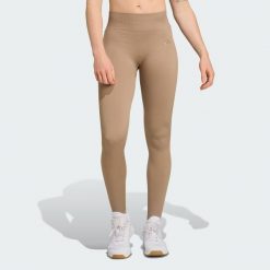 Długie dzianinowe legginsy do ćwiczeń Essentials. Zielone legginsy sportowe damskie Adidas, xs, bez wzorów, z dzianiny, długie, na fitness i siłownię, climacool (adidas). Za 217.30 zł.