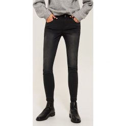 Jeansy skinny - Czarny. Czarne jeansy damskie House. Za 99.99 zł.