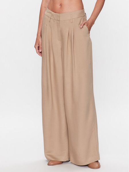 Herskind Spodnie materiałowe Lotus 4822840 Beżowy Regular Fit. Brązowe spodnie materiałowe damskie Herskind, bez wzorów, z materiału. Za 599.00 zł.