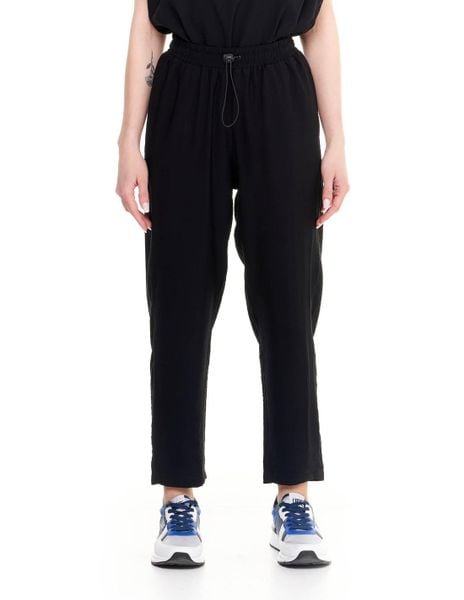 Błyszczące, satynowe spodnie damskie. Czarne spodnie materiałowe damskie LEONE 1947 APPAREL, l, bez wzorów, z bawełny, na fitness i siłownię. Za 84.16 zł.