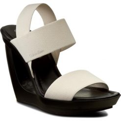Sandały CALVIN KLEIN - Yelena N11400 Soft White. Sandały damskie marki Calvin Klein. W wyprzedaży za 369.00 zł.