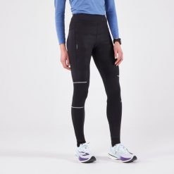 Legginsy do biegania damskie Kiprun Warm Rain ocieplane. Czarne legginsy damskie KIPRUN, s, bez wzorów, z elastanu, do biegania. Za 189.99 zł.