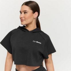 Bluza damska fitness z kapturem Cropped Relay Black. Czarne bluzy damskie GYMBEAM, m, bez wzorów, z materiału, z kapturem, na fitness i siłownię. Za 128.90 zł.