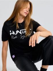 Bawełniana koszulka oversize z nadrukiem K-Pop Demon Hunters - czarny. Czarne t-shirty damskie Sinsay, l, bez wzorów, z bawełny, bez kołnierzyka. Za 25.99 zł.