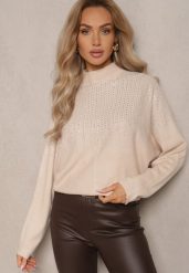 Beżowy Golf o Kroju Oversize z Eleganckim Cyrkoniowym Zdobieniem przy Dekolcie Melirra. Brązowe swetry damskie Renee, na zimę, z aplikacjami, eleganckie, bez kołnierzyka, bez ramiączek, bez kaptura. Za 84.99 zł.