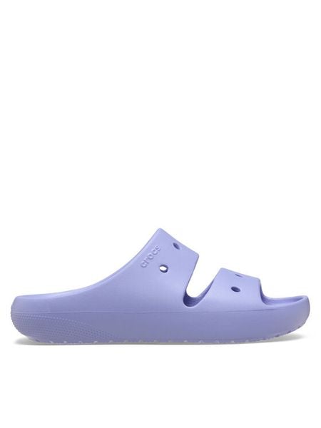Crocs Klapki Classic Sandal v2 209403 Fioletowy. Fioletowe klapki damskie Crocs, bez wzorów, z tworzywa sztucznego, bez obcasa. Za 135.15 zł.