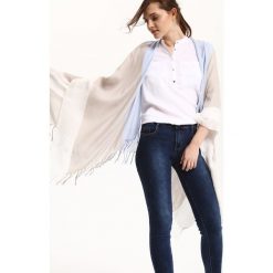 PONCZO DAMSKIE. Swetry damskie marki TOP SECRET. W wyprzedaży za 24.99 zł.