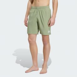 SZORTY DO PŁYWANIA Z NOGAWKAMI O DŁUGOŚCI 20,5 CM. Zielone krótkie spodenki sportowe męskie Adidas, l, bez wzorów, z materiału, do pływania. Za 119.00 zł.
