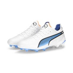 Buty piłkarskie KING ULTIMATE FG/AG Kobiety PUMA. Białe obuwie sportowe damskie Puma, bez wzorów, z materiału, do piłki nożnej. Za 551.00 zł.