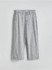 Jeansy baggy z efektem sprania - jasnoszary. Szare jeansy męskie Reserved. Za 159.99 zł.