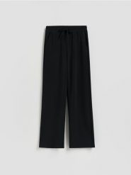 Spodnie dresowe long leg - czarny. Czarne spodnie dresowe damskie Reserved, l, bez wzorów, z dresówki. Za 119.99 zł.