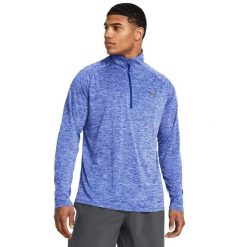 Koszulka treningowa Under Armour męska 1/2 Zip z długim rękawem - Niebieska. Niebieskie koszulki sportowe męskie Under Armour, m, bez wzorów, z materiału, bez kołnierzyka, bez ramiączek, do biegania. Za 227.40 zł.